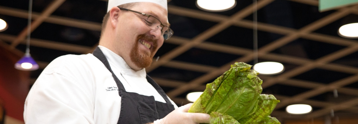 Photo of chef examining produce