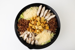 Caesar Salad with Grilled Chicken & Bacon Crisp romaine topped with seasoned croutons, sliced grilled chicken breast, crumbled bacon, and shredded parmesan cheese with Caesar Dressing Small (serves 5) $16.99 | Medium (serves 10) $27.99 | Large (serves 20)