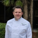 Chef John Gamradt in NACUFS chef coat at the NACUFS conference 