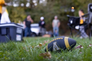 App State football in grass at tailgating event