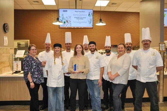 Campus dining staff posing with Feast Award